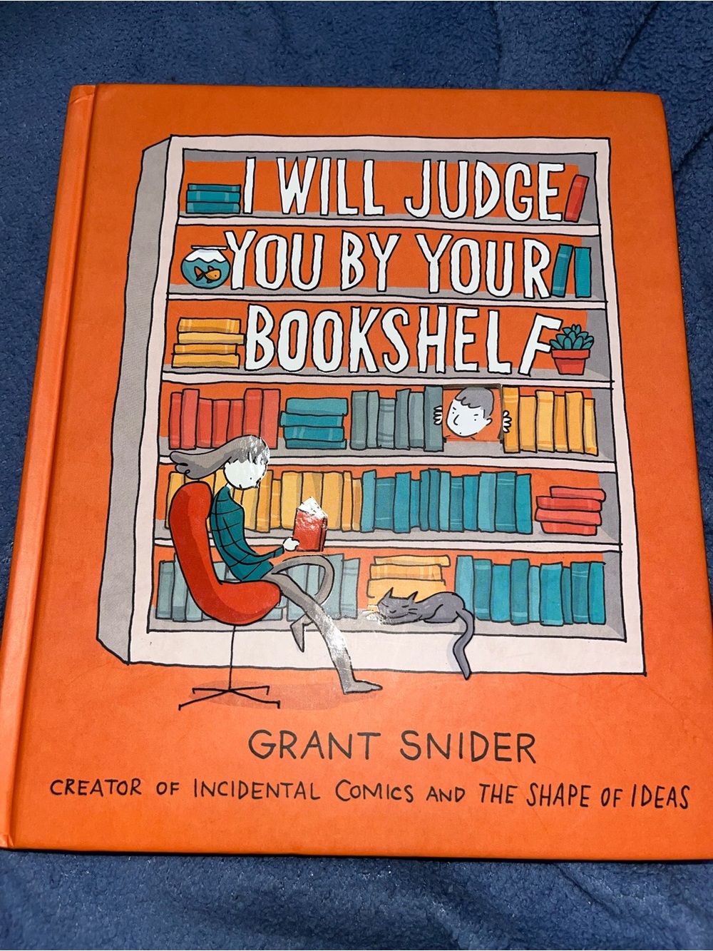 "I Will Judge You By Your Bookshelf" Orange Hardcover Graphic Novel Full Color